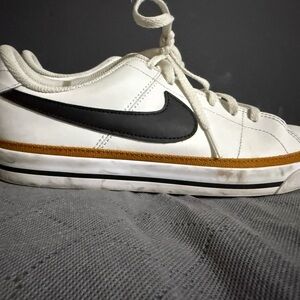 Nike Kids White and Black Sneakers with Gold Accent